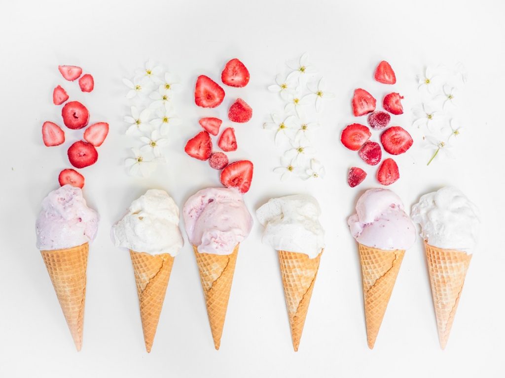 steps to open an ice cream shop. Six ice cream cones with strawberries